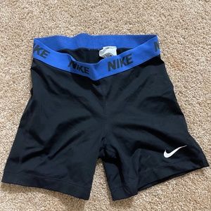 Nike, black spandex with dark blue band, Size S